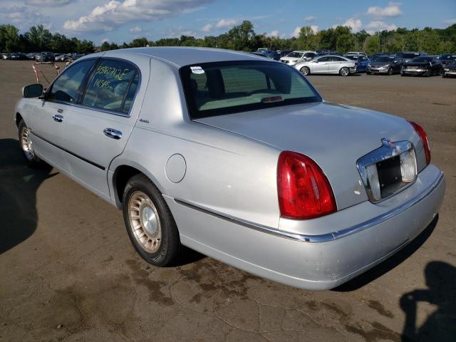 Photo 3 from auction – 2001 LINCOLN TOWN CAR E with VIN 1LNHM81WX1Y653796