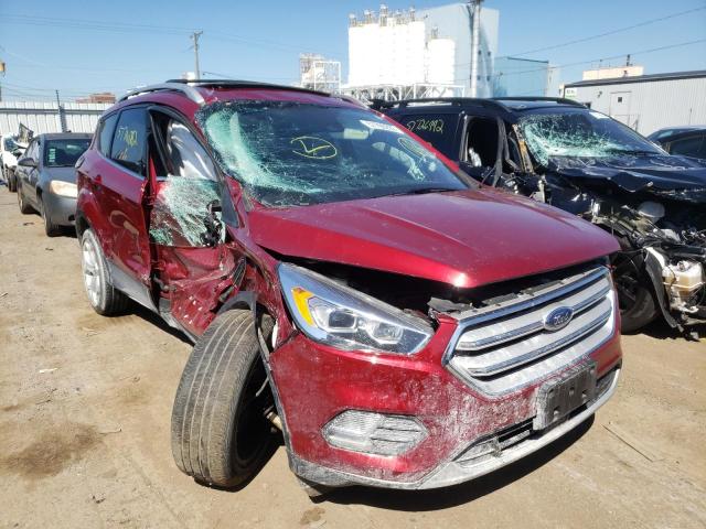 FORD ESCAPE TIT 2018 with VIN 1FMCU9J98JUB06771 - Photo from auction