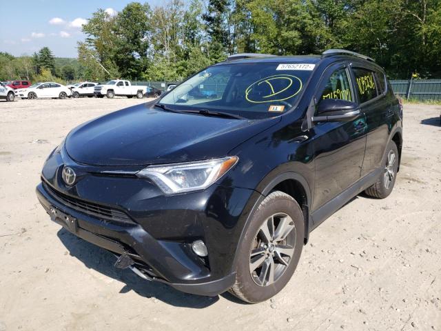 Photo 2 from auction – 2017 TOYOTA RAV4 XLE with VIN 2T3RFREV4HW656188