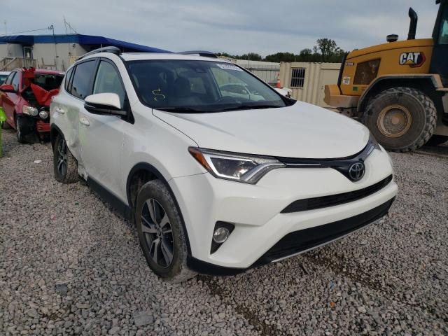 TOYOTA RAV4 XLE 2017 with VIN JTMRFREV1HJ716622 - Photo from auction