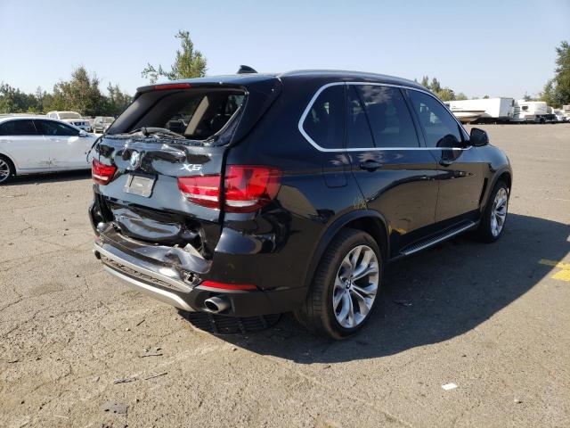 Photo 4 from auction – 2014 BMW X5 XDRIVE3 with VIN 5UXKR0C5XE0H22560