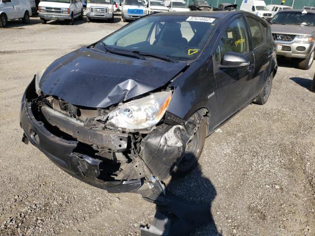 Photo 2 from auction – 2014 TOYOTA PRIUS C with VIN JTDKDTB35E1558093