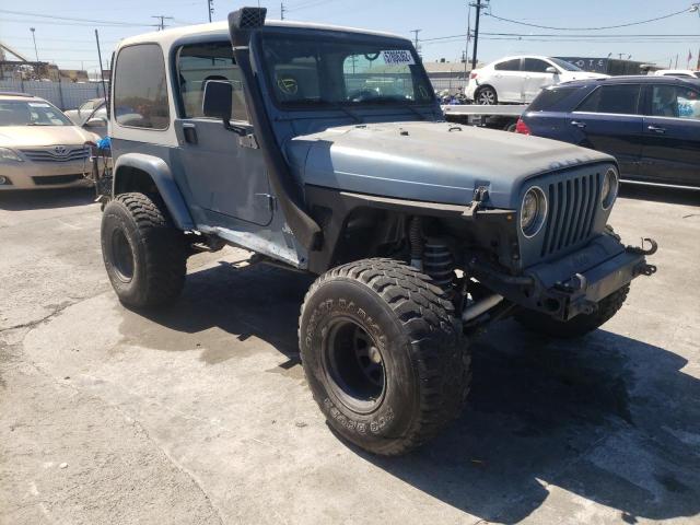 JEEP WRANGLER / 1999 with VIN 1J4FY19S9XP427363 - Photo from auction