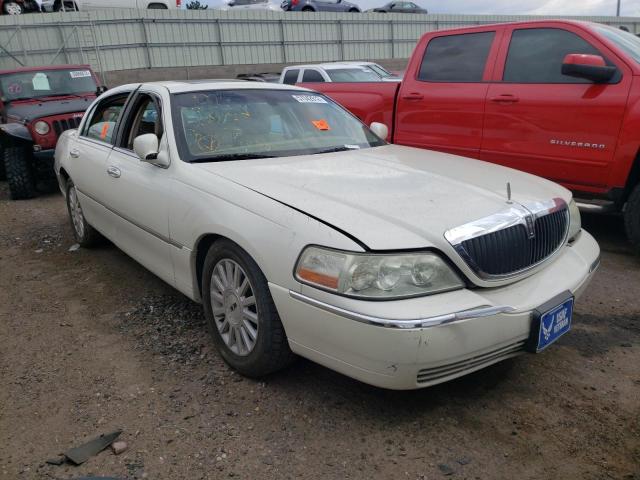LINCOLN TOWN CAR U 2004 with VIN 1LNHM83W24Y637044 - Photo from auction