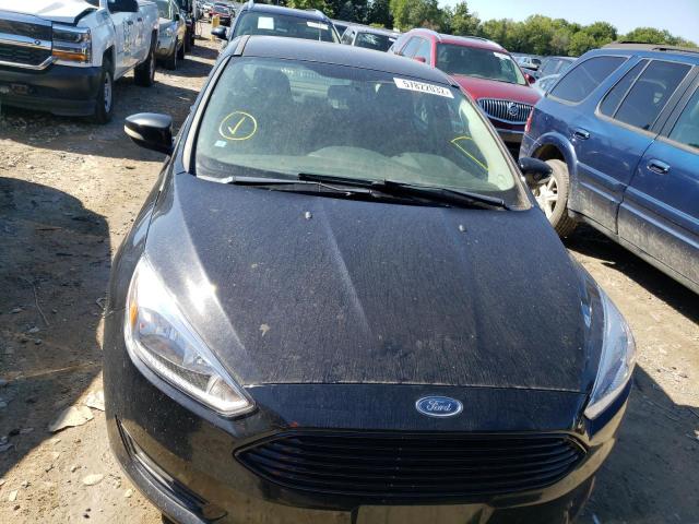 Photo 9 from auction – 2016 FORD FOCUS SE with VIN 1FADP3FE4GL302276