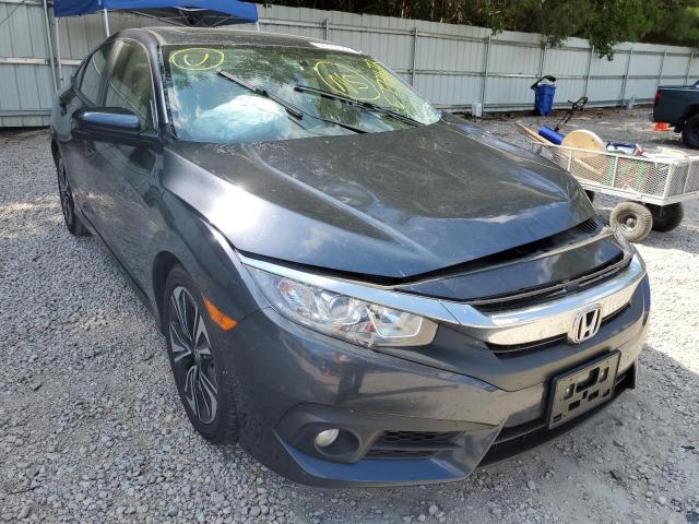 HONDA CIVIC EX 2018 with VIN JHMFC1F3XJX031417 - Photo from auction