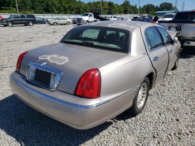 Photo 4 from auction – 2001 LINCOLN TOWN CAR E with VIN 1LNHM81W81Y690958