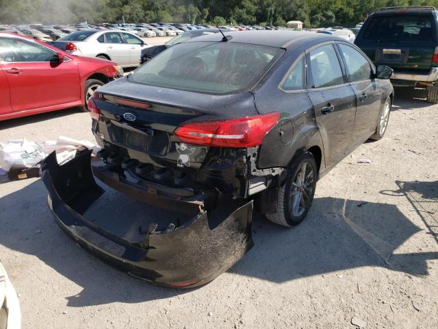 Photo 4 from auction – 2017 FORD FOCUS SE with VIN 1FADP3F28HL214435