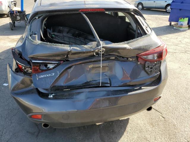 Photo 9 from auction – 2014 MAZDA 3 TOURING with VIN JM1BM1L76E1172322