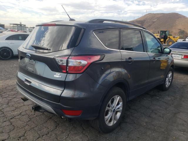 Photo 4 from auction – 2017 FORD ESCAPE SE with VIN 1FMCU9GD1HUD41373