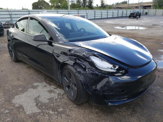 TESLA MODEL 3 2022 with VIN 5YJ3E1EA7NF185310 - Photo from auction