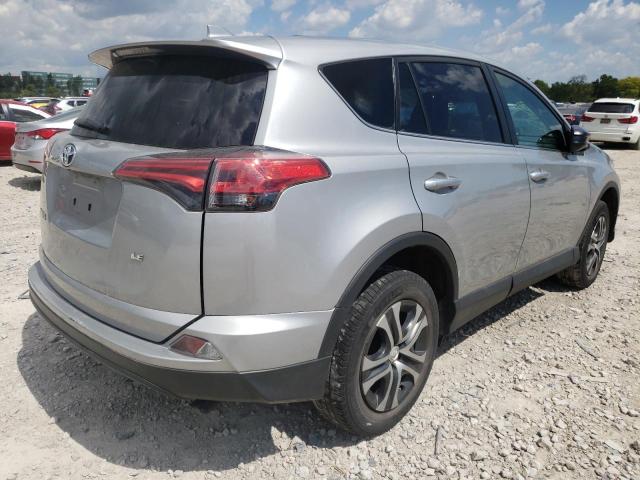 Photo 4 from auction – 2018 TOYOTA RAV4 LE with VIN 2T3ZFREV8JW517588