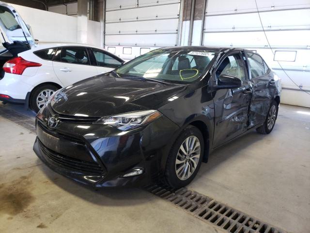 Photo 2 from auction – 2017 TOYOTA COROLLA L with VIN 2T1BURHE6HC774854