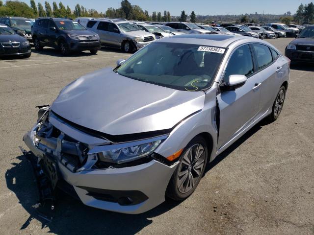 Photo 2 from auction – 2018 HONDA CIVIC EX with VIN 19XFC1F33JE201554