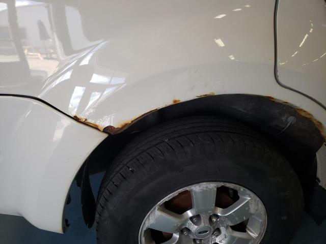 Photo 9 from auction – 2010 FORD ESCAPE LIM with VIN 1FMCU9EG7AKA68633