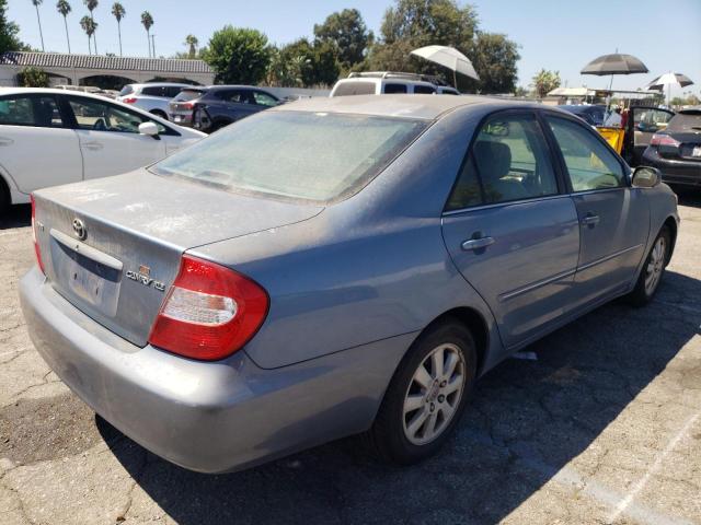 Photo 4 from auction – 2004 TOYOTA CAMRY LE with VIN 4T1BE32K94U859771