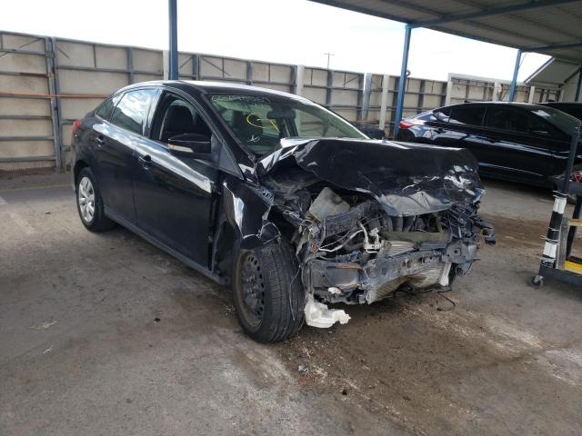 FORD FOCUS SE 2014 with VIN 1FADP3F20EL276021 - Photo from auction