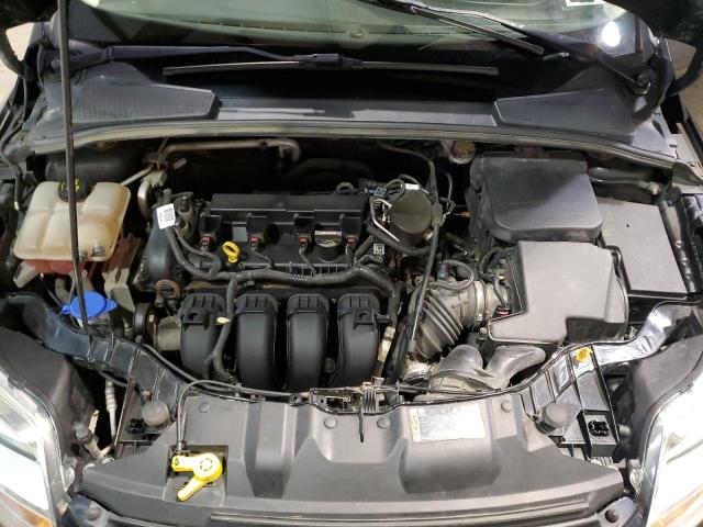 Photo 7 from auction – 2014 FORD FOCUS S with VIN 1FADP3E21EL304345
