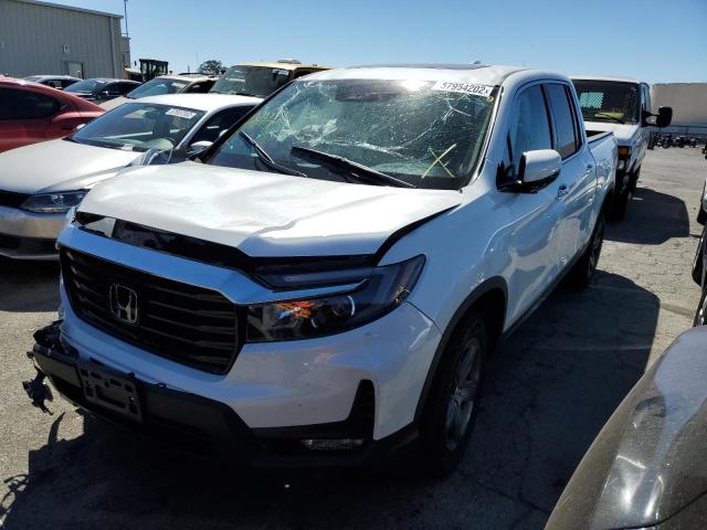 Photo 2 from auction – 2022 HONDA RIDGELINE with VIN 5FPYK3F70NB001684