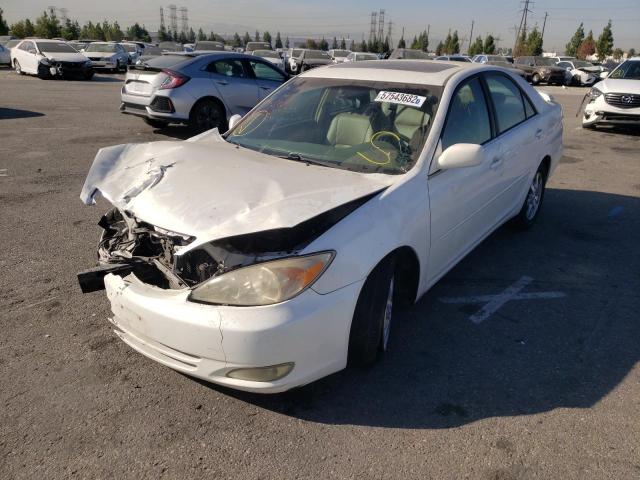 Photo 2 from auction – 2004 TOYOTA CAMRY LE with VIN JTDBE32K840249758