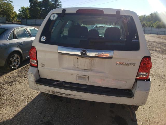 Photo 9 from auction – 2010 MAZDA TRIBUTE I with VIN 4F2CY0C79AKM07061