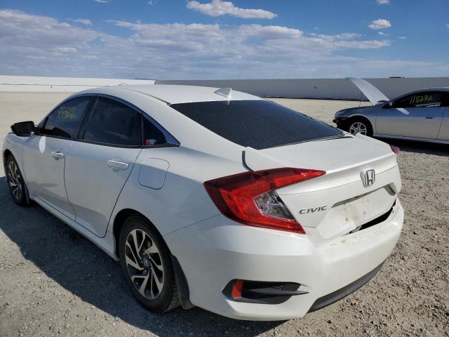 Photo 3 from auction – 2018 HONDA CIVIC EX with VIN 2HGFC2F74JH509704