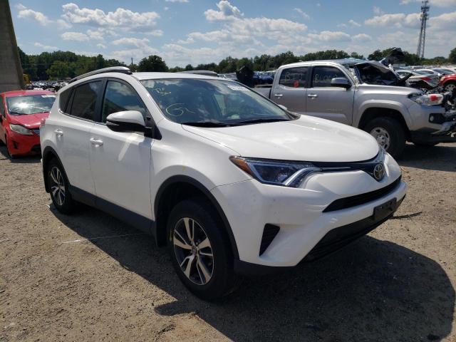 Photo 1 from auction – 2018 TOYOTA RAV4 LE with VIN 2T3BFREV8JW776616