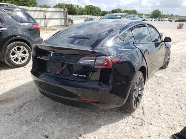 Photo 4 from auction – 2021 TESLA MODEL 3 with VIN 5YJ3E1EC3MF033976