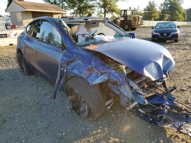 TESLA MODEL Y 2022 with VIN 7SAYGAEE9NF514949 - Photo from auction