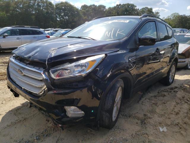 Photo 2 from auction – 2018 FORD ESCAPE SE with VIN 1FMCU9GD2JUB34738