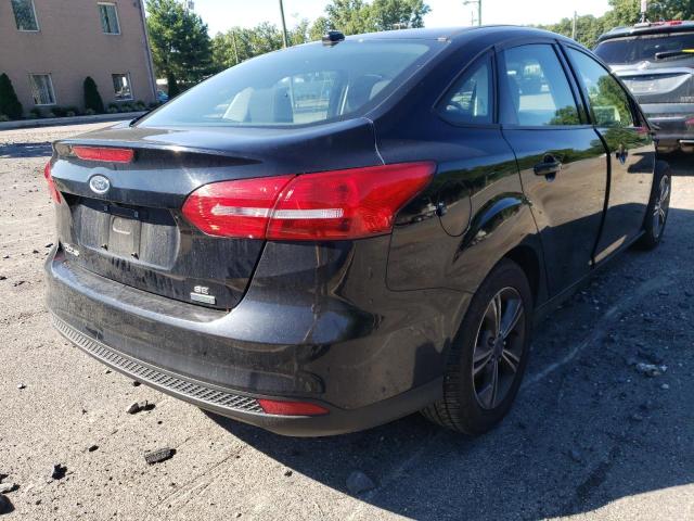 Photo 4 from auction – 2017 FORD FOCUS SE with VIN 1FADP3FE3HL257414