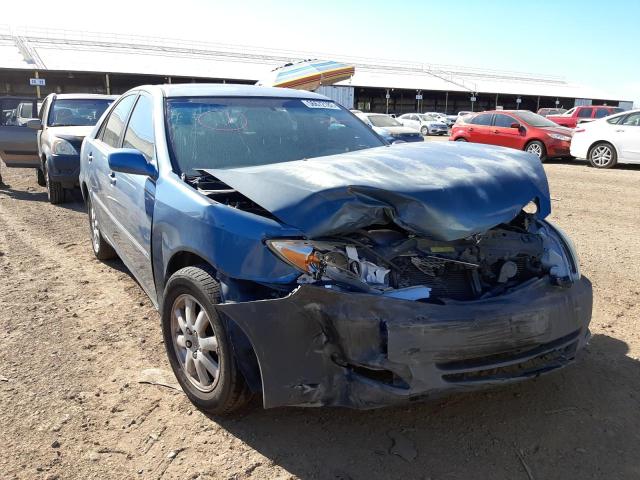 TOYOTA CAMRY LE 2004 with VIN 4T1BE30K44U911861 - Photo from auction