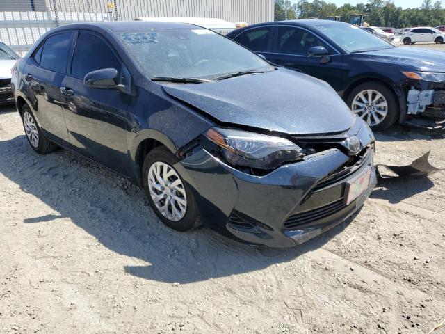 TOYOTA COROLLA 2018 with VIN 5YFBURHE0JP760714 - Photo from auction