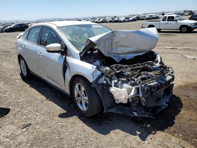 FORD FOCUS SE 2014 with VIN 1FADP3F23EL310064 - Photo from auction