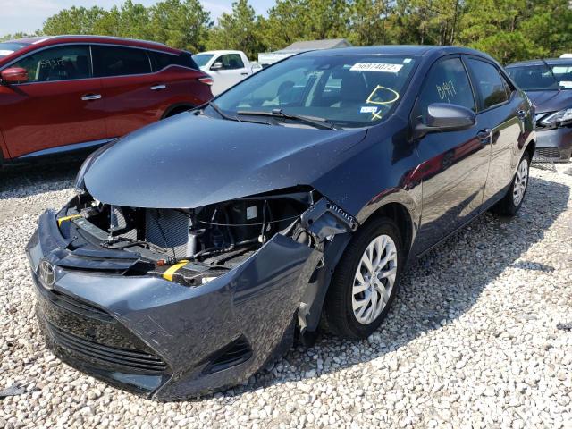 Photo 2 from auction – 2017 TOYOTA COROLLA L with VIN 5YFBURHE5HP724754