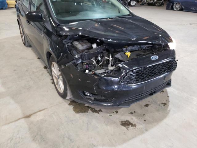 Photo 9 from auction – 2018 FORD FOCUS SE with VIN 1FADP3F21JL236962