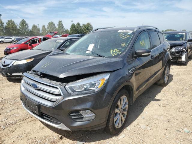 Photo 2 from auction – 2017 FORD ESCAPE TIT with VIN 1FMCU9J90HUD28358