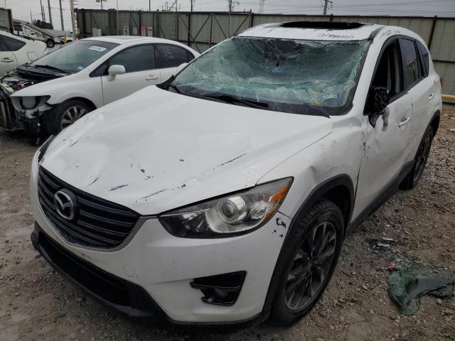 Photo 2 from auction – 2016 MAZDA CX-5 GT with VIN JM3KE2DY8G0709847