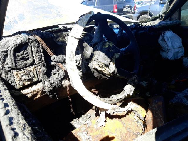 Photo 9 from auction – 2004 GMC YUKON with VIN 1GKEK13V74J213691