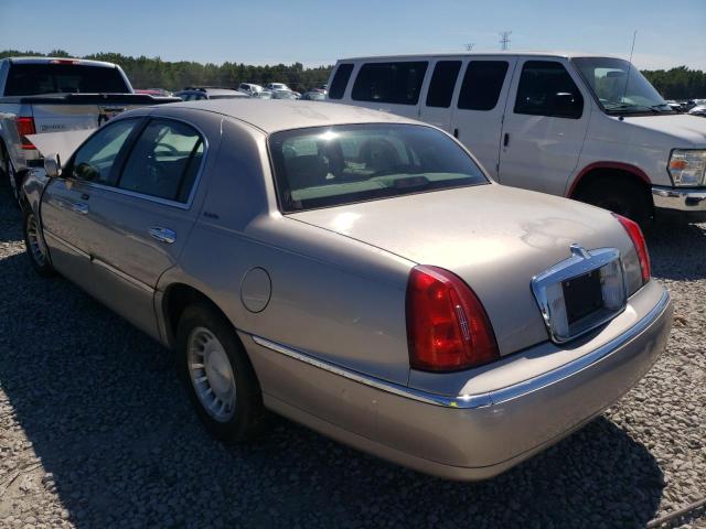 Photo 3 from auction – 2001 LINCOLN TOWN CAR E with VIN 1LNHM81W81Y690958
