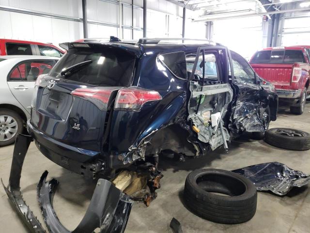 Photo 4 from auction – 2018 TOYOTA RAV4 LE with VIN JTMBFREV5JJ229768