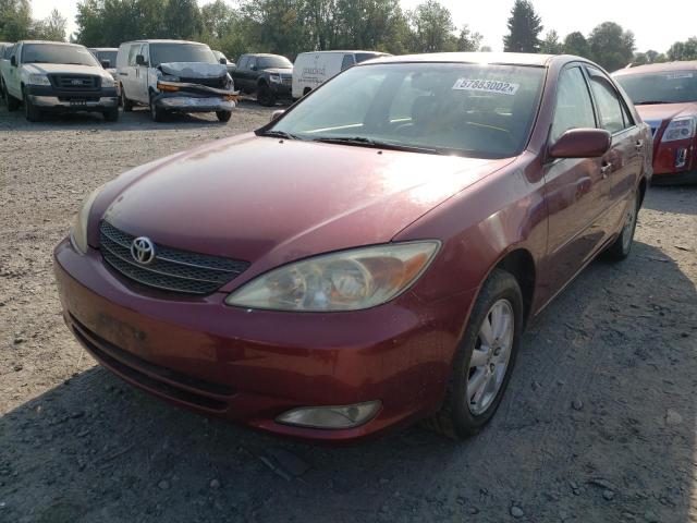 Photo 2 from auction – 2003 TOYOTA CAMRY LE with VIN JTDBE30K430180584