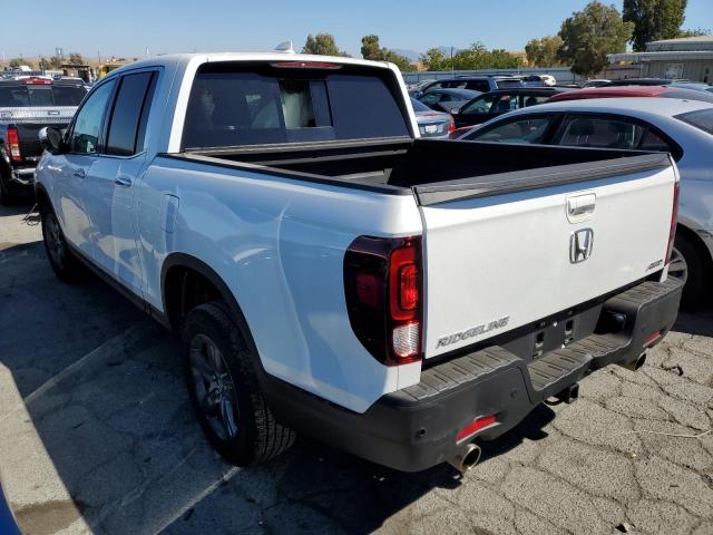 Photo 3 from auction – 2022 HONDA RIDGELINE with VIN 5FPYK3F70NB001684