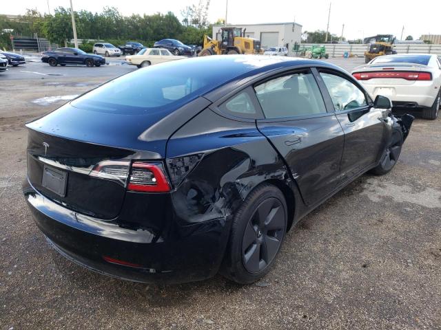 Photo 4 from auction – 2022 TESLA MODEL 3 with VIN 5YJ3E1EA7NF185310