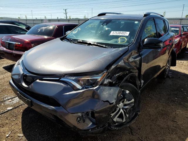 Photo 2 from auction – 2017 TOYOTA RAV4 LE with VIN JTMBFREV9HJ167608