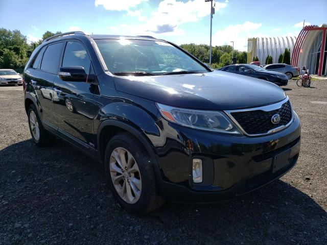 KIA SORENTO EX 2015 with VIN 5XYKUDA72FG657014 - Photo from auction
