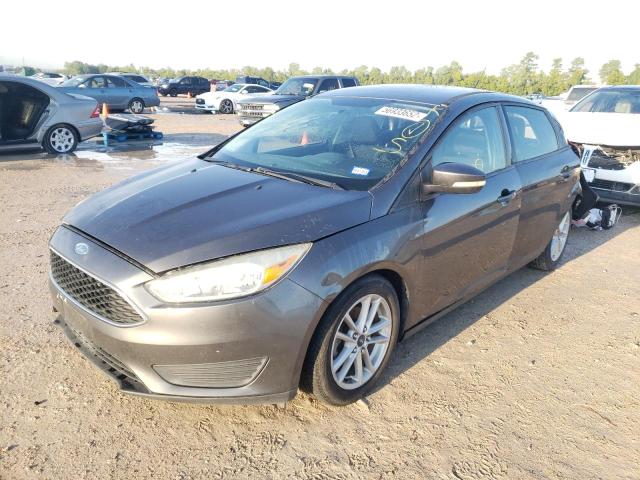 Photo 2 from auction – 2015 FORD FOCUS SE with VIN 1FADP3K29FL233272