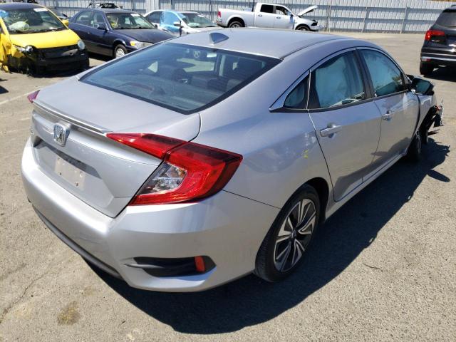 Photo 4 from auction – 2018 HONDA CIVIC EX with VIN 19XFC1F33JE201554