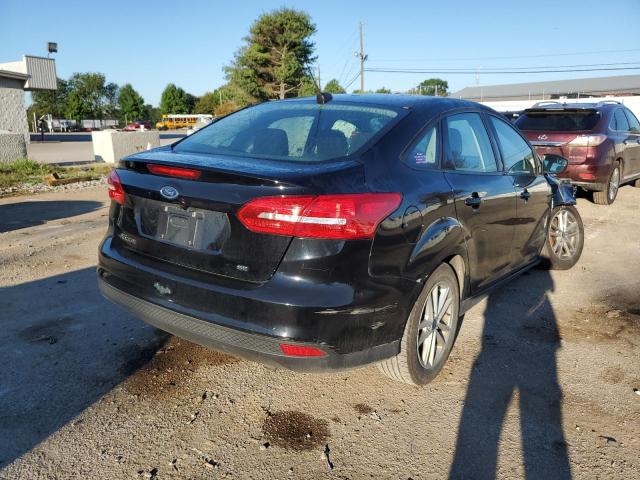 Photo 4 from auction – 2018 FORD FOCUS SE with VIN 1FADP3F29JL310113