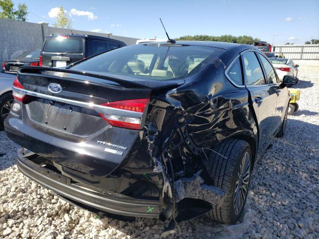 Photo 4 from auction – 2018 FORD FUSION TIT with VIN 3FA6P0D92JR151220